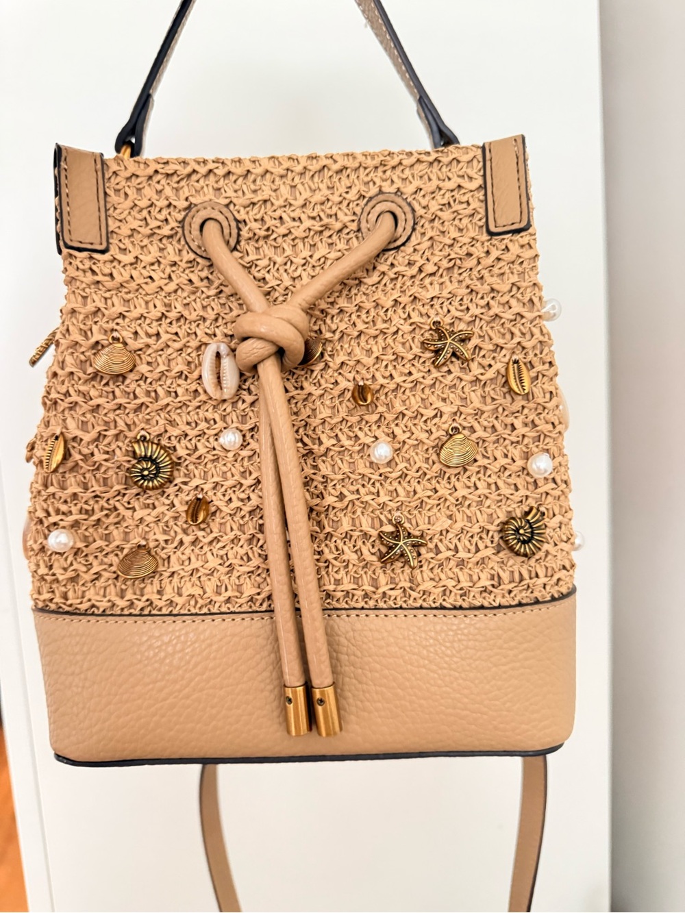 Steve Madden Tan Crochet Drawstring Backpack with Shell & Pearl Accents